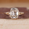 Bezel engagement ring with cushion old mine cut diamond solitaire style.