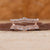 Double curved wedding band in rose gold finish.
