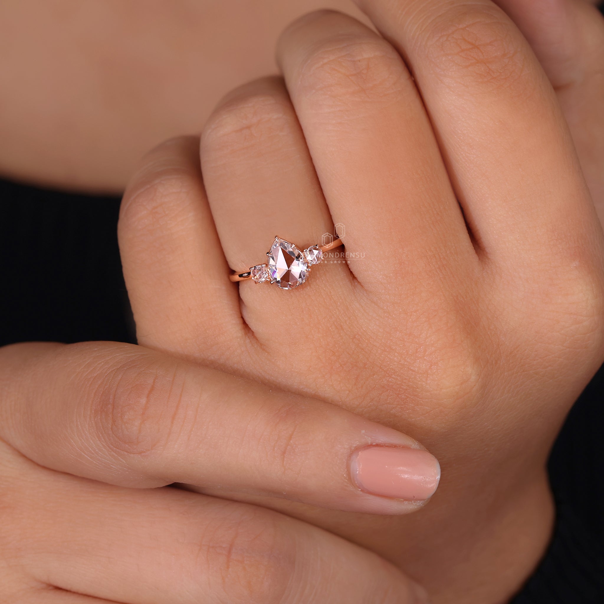 Diamondrensu UK engagement ring styled as pear diamond ring
