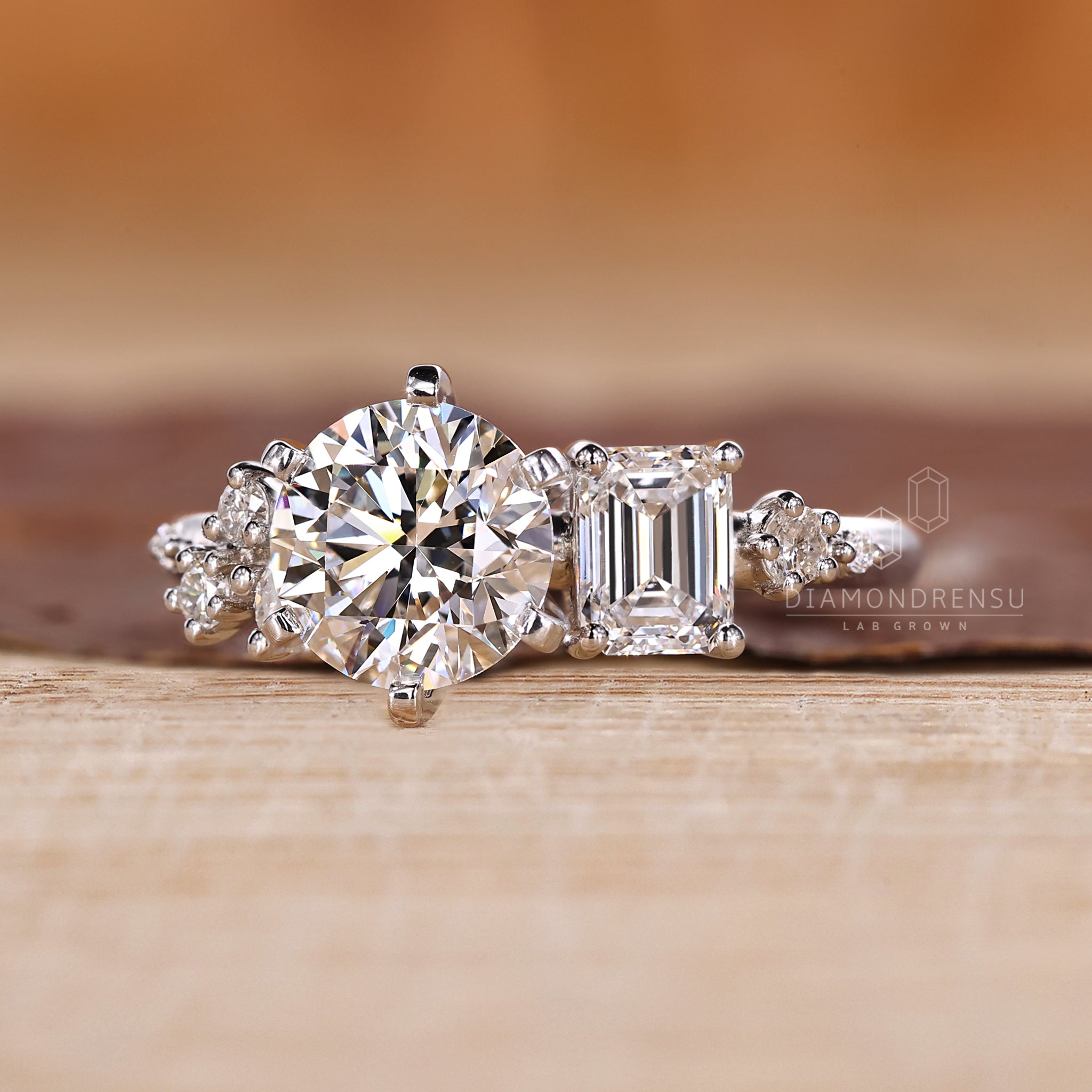 Emerald diamond ring crafted in white gold.
