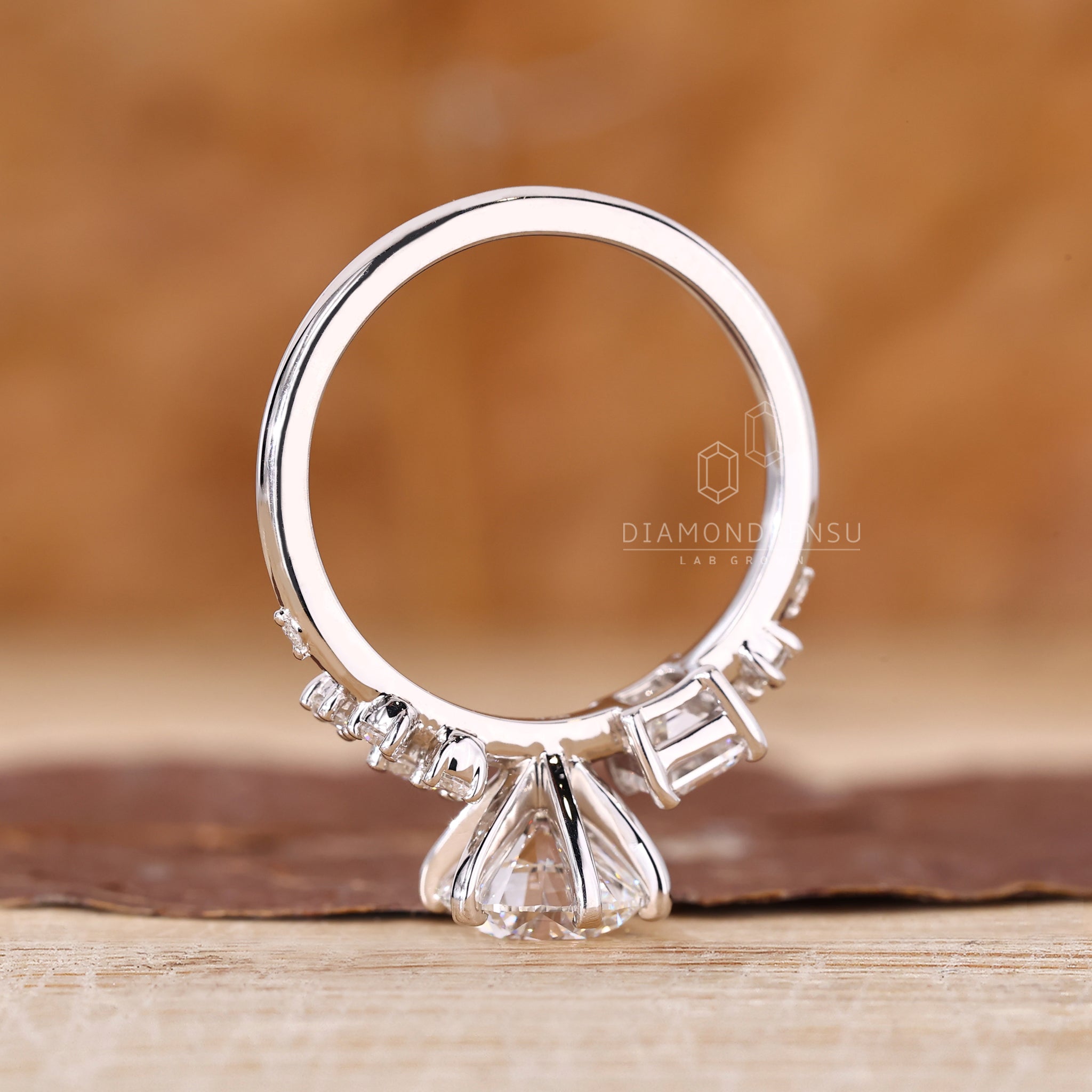 Custom engagement ring featuring cluster diamond style.
