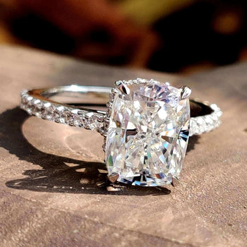 Elongated crushed ice cushion cut moissanite ring.
