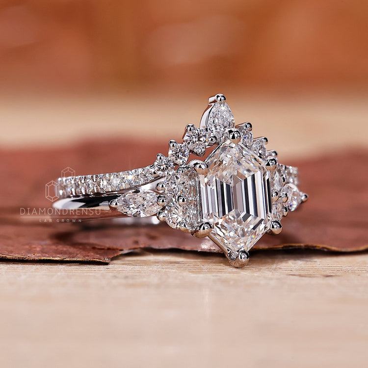 Chevron wedding band paired with pear and round diamond band.
