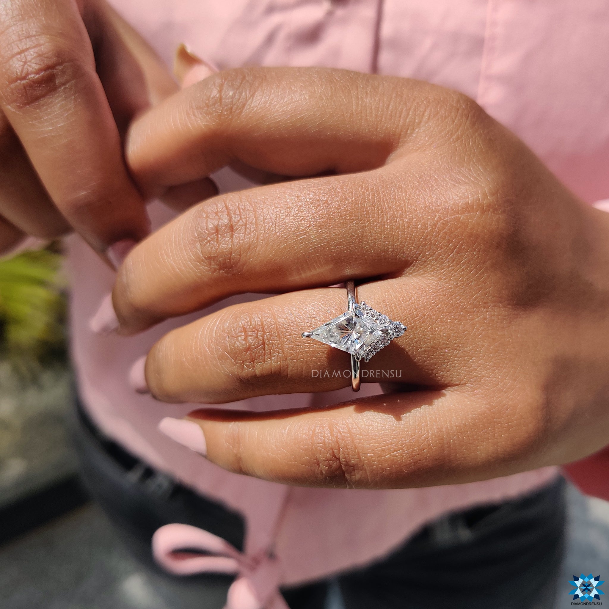 Moissanite for engagement ring with secure compass prong and half halo.
