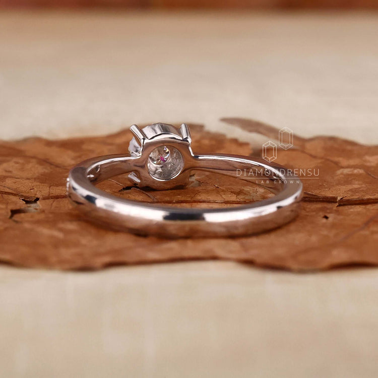 Halo round diamond engagement ring featuring a unique design with igi certified Lab Grown Diamond.
