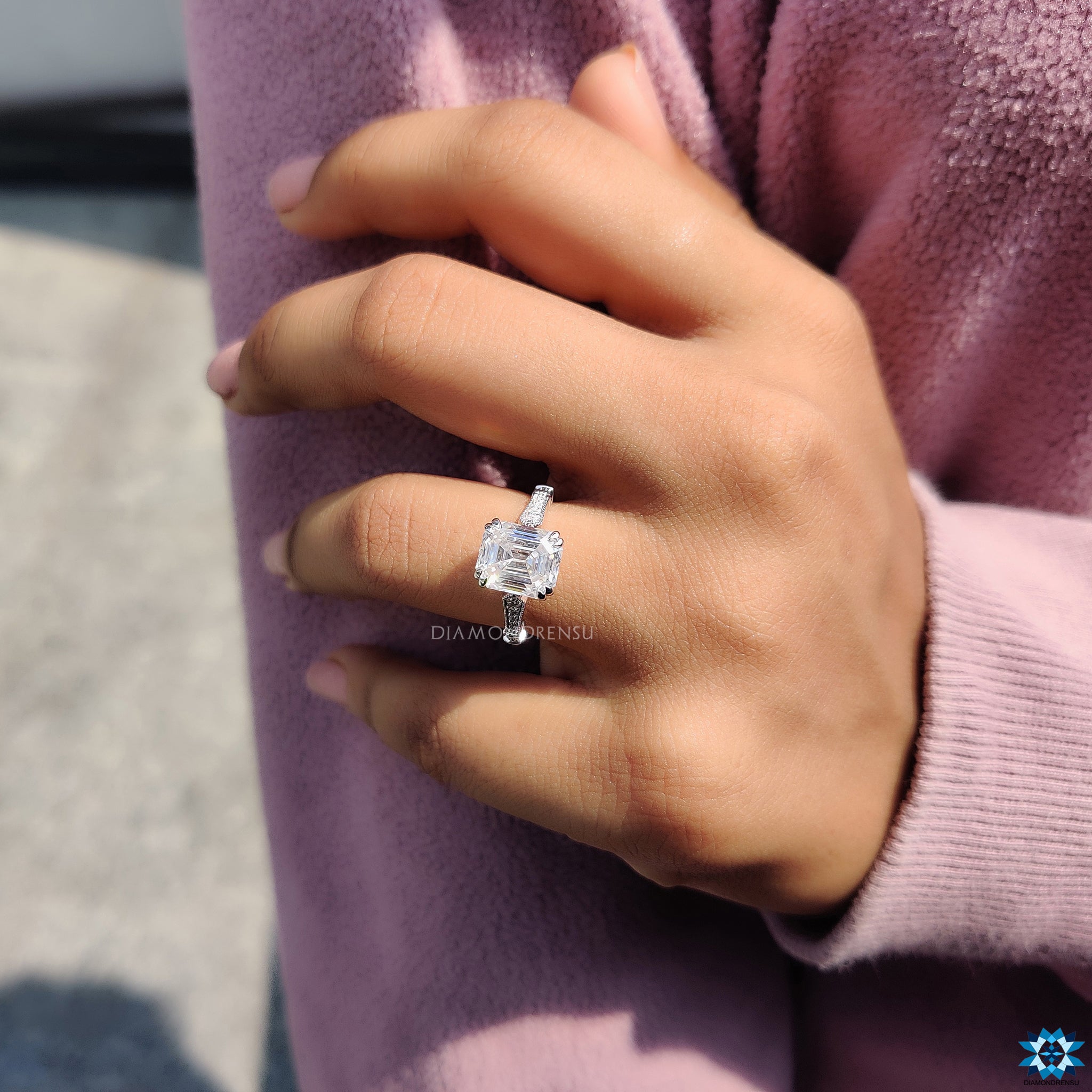 Custom engagement ring with vintage milgrain and emerald moissanite centre stone.
