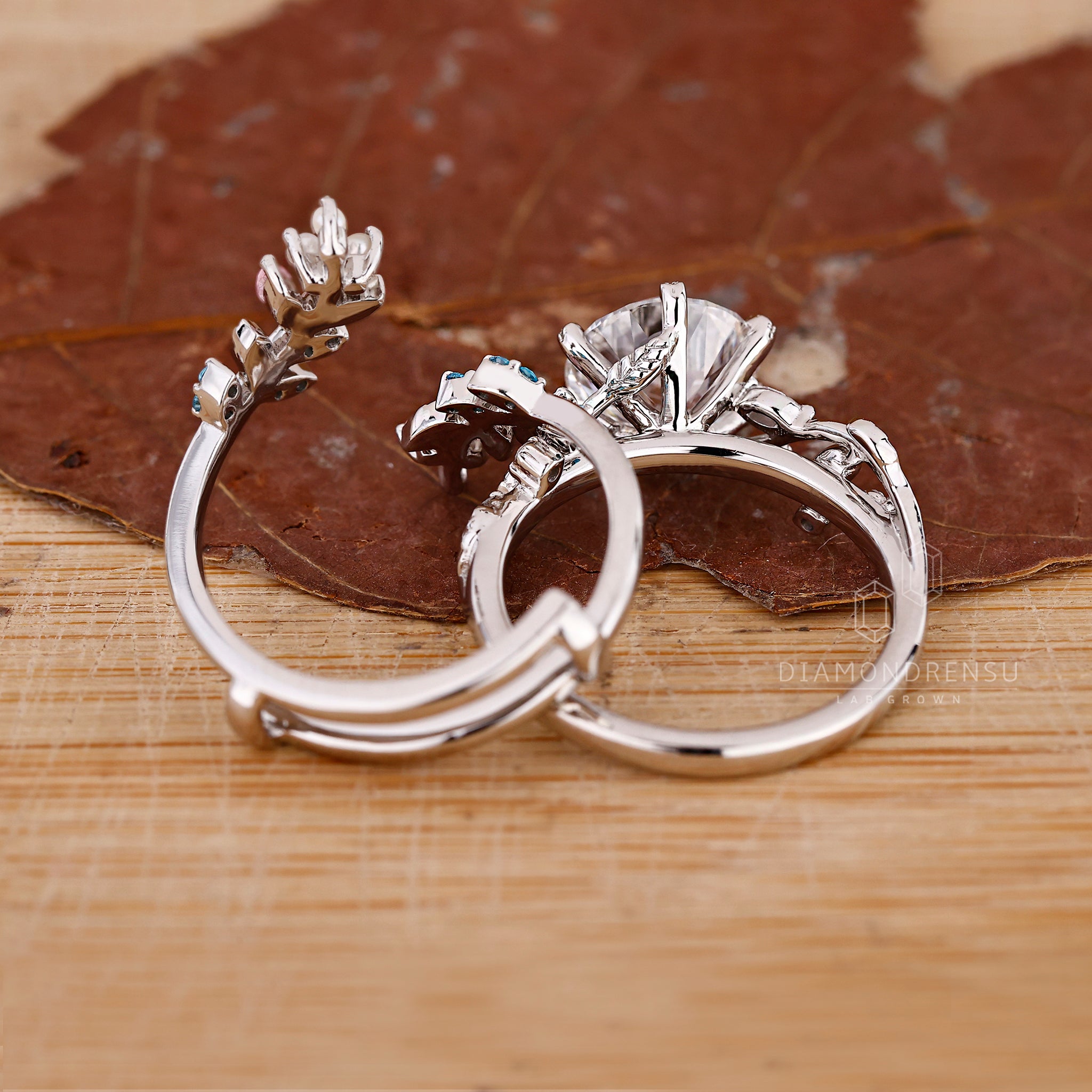 Marquise pink sapphire band with handmade detailing.
