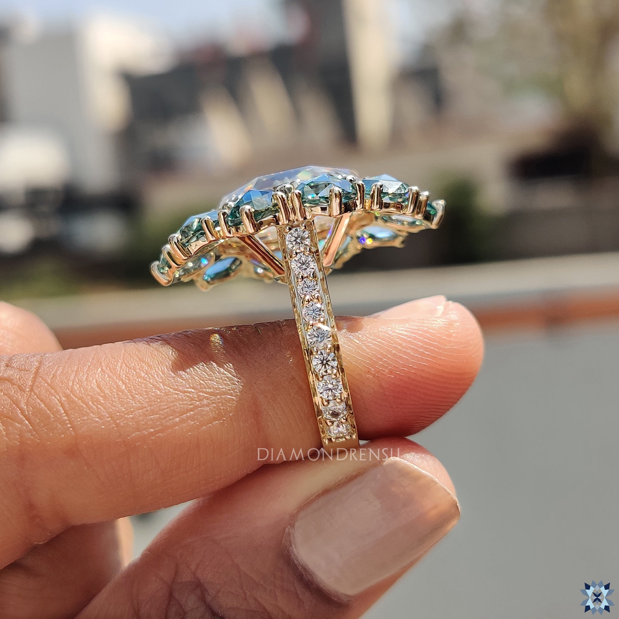 Triple prong ring in oval cut engagement ring setting
