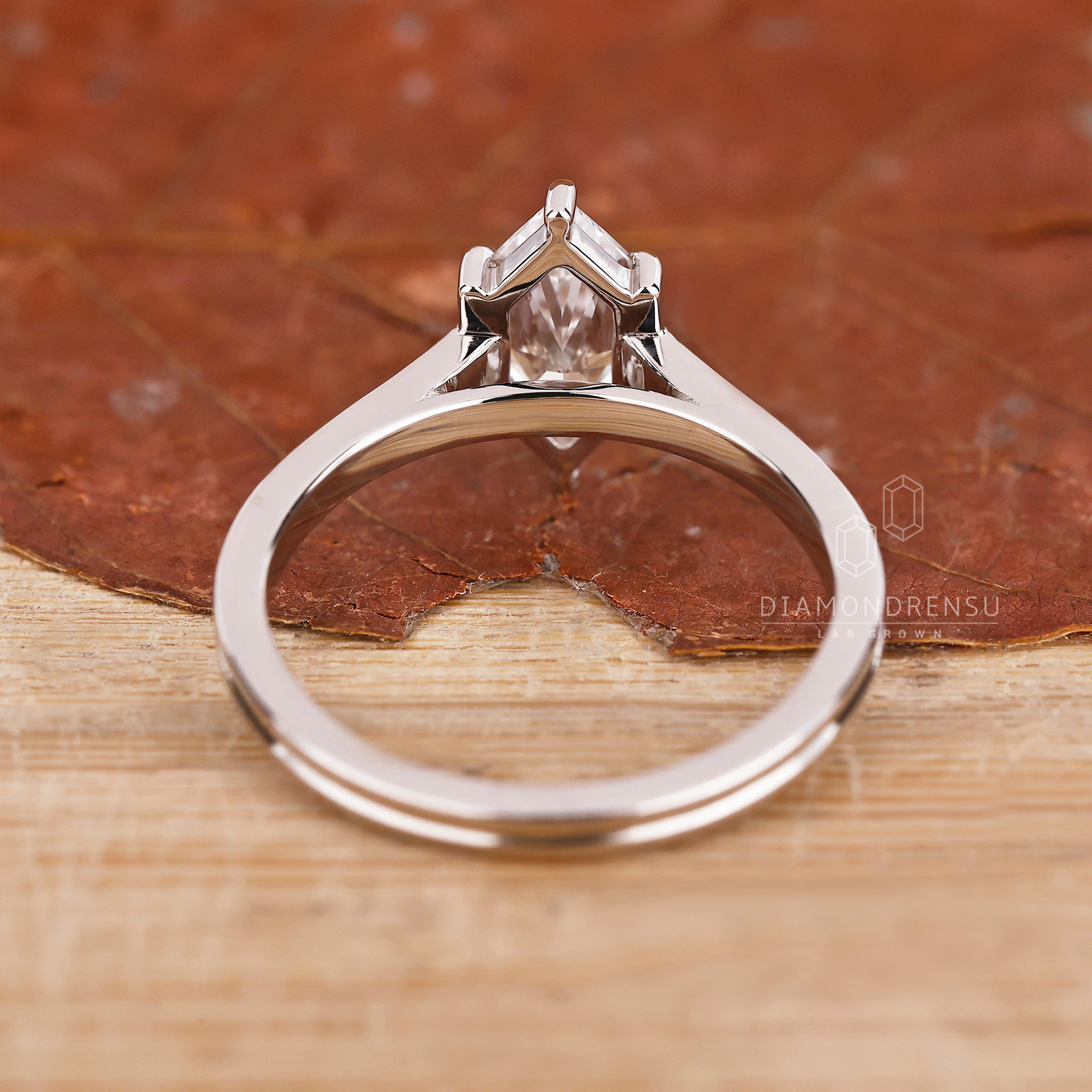 Unique engagement ring designed as Dutch marquise diamond ring.
