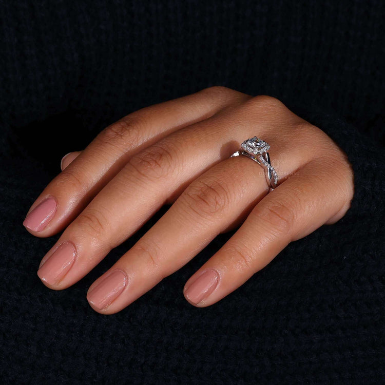 Cushion halo engagement ring featuring pave ring diamond detailing, handcrafted for a one-of-a-kind creation.
