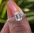 Emerald Cut Moissanite Ring with hidden halo moissanite ring design.