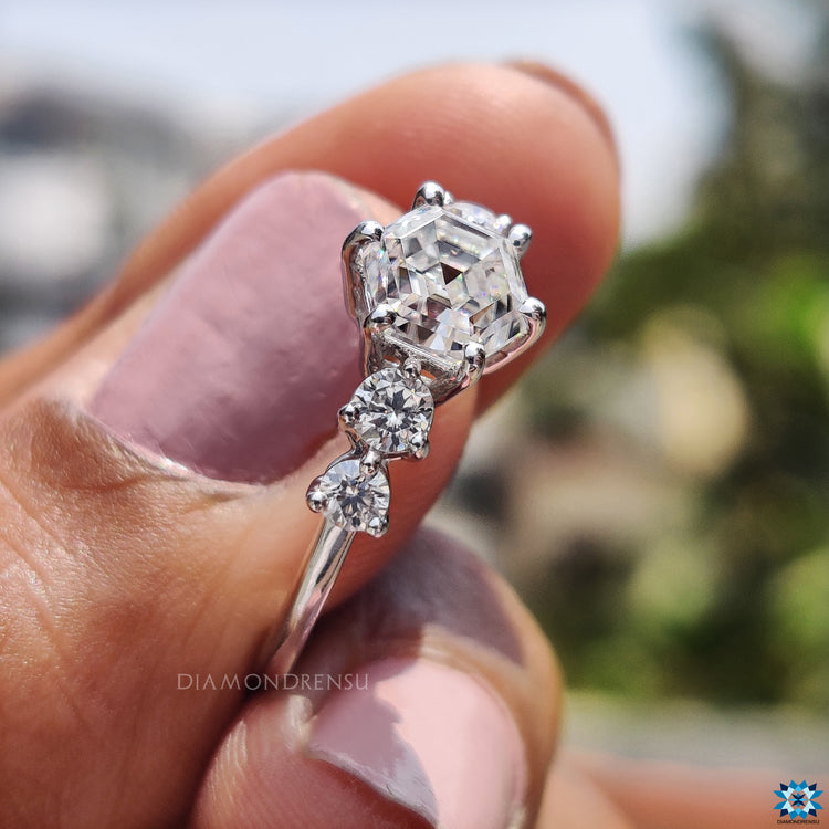 Moissanite for an engagement ring featuring prong set hexagon centerpiece.

