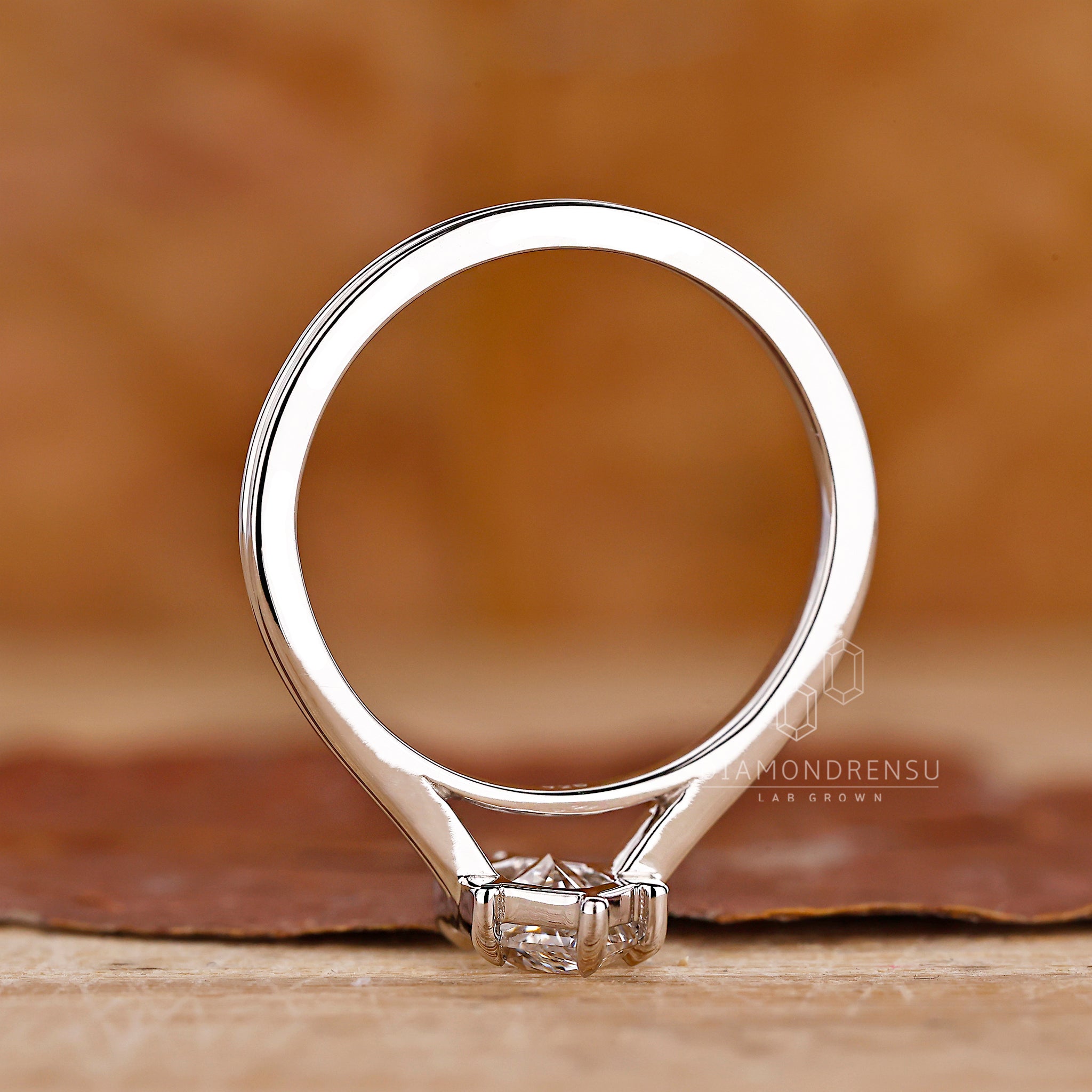 UK engagement ring made with diamond solitaire ring style.
