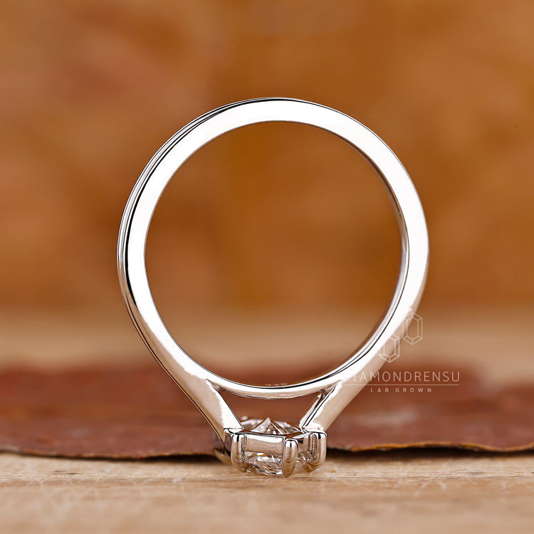 UK engagement ring made with diamond solitaire ring style.
