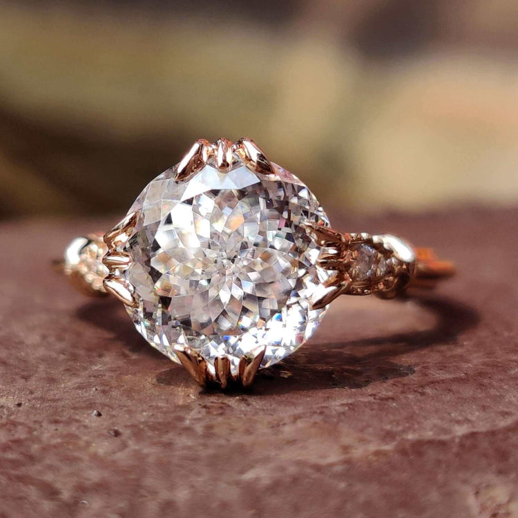Vintage style Portuguese cut moissanite engagement ring.
