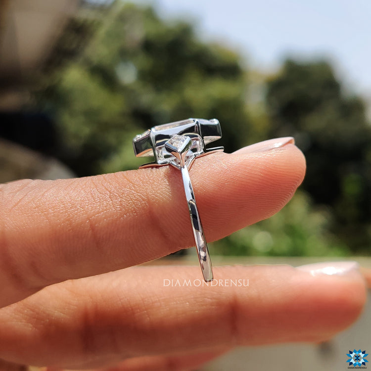 Handmade jewellery featuring hexagon moissanite and two kite shaped sides.
