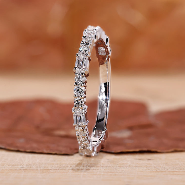 Half eternity wedding ring with emerald cut diamonds.
