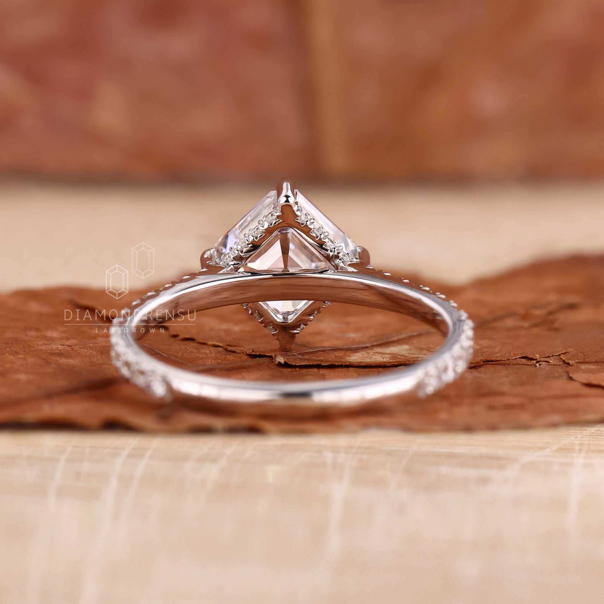 Cathedral hidden halo ring with a graceful and sophisticated design.