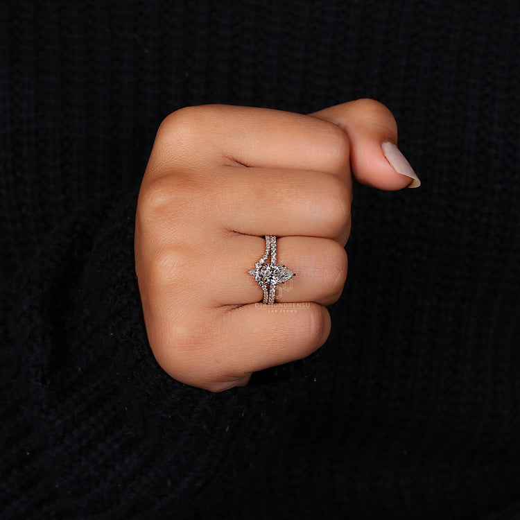 Pear and round diamond wedding ring set.
