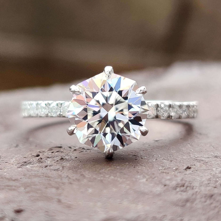 Octagon cut moissanite engagement ring in white gold.
