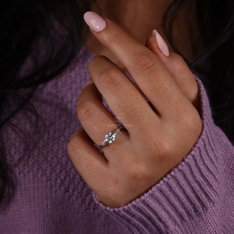 Round ring diamond design with a 3 stone setting, perfect for a unique engagement ring crafted with care.