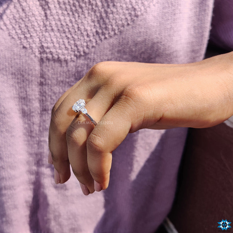 Moissanite for engagement ring in oval and pear cut layout.
