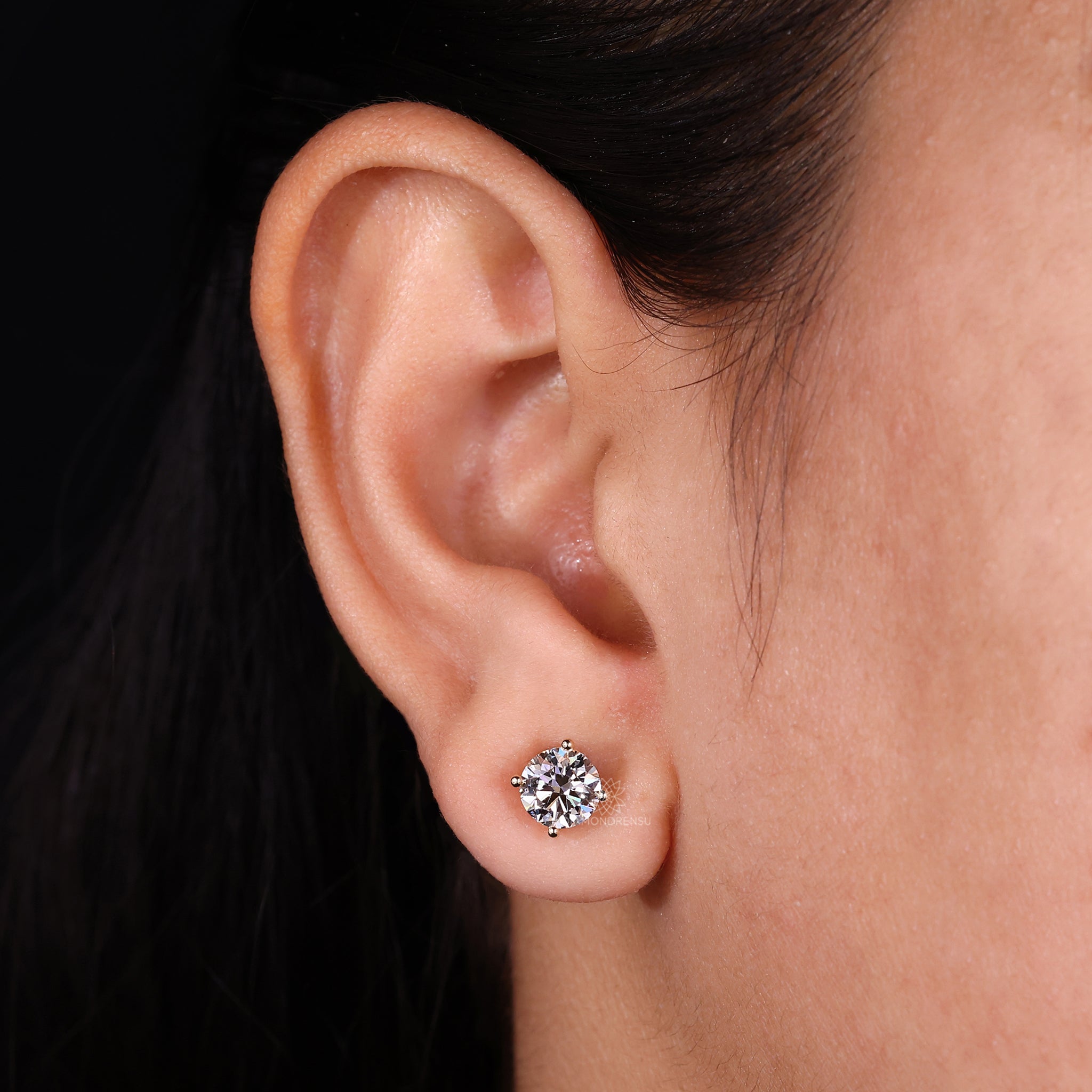Handmade yellow gold stud earrings featuring lab grown diamond studs.