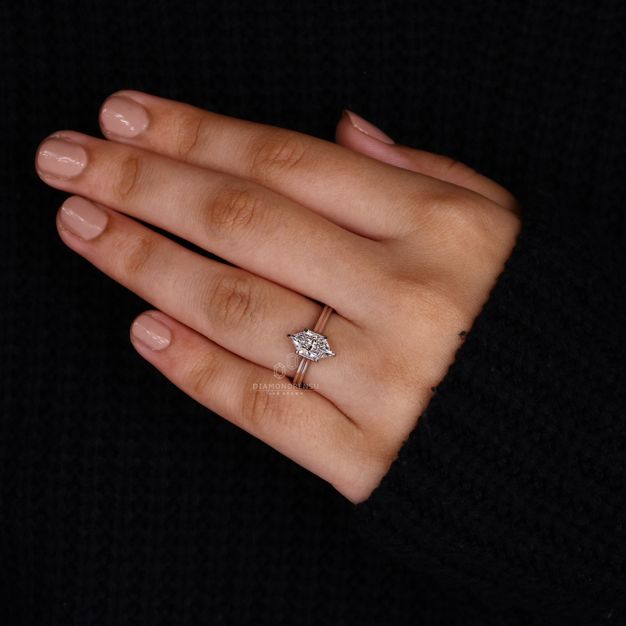 Buy engagement ring featuring dual shank setting.
