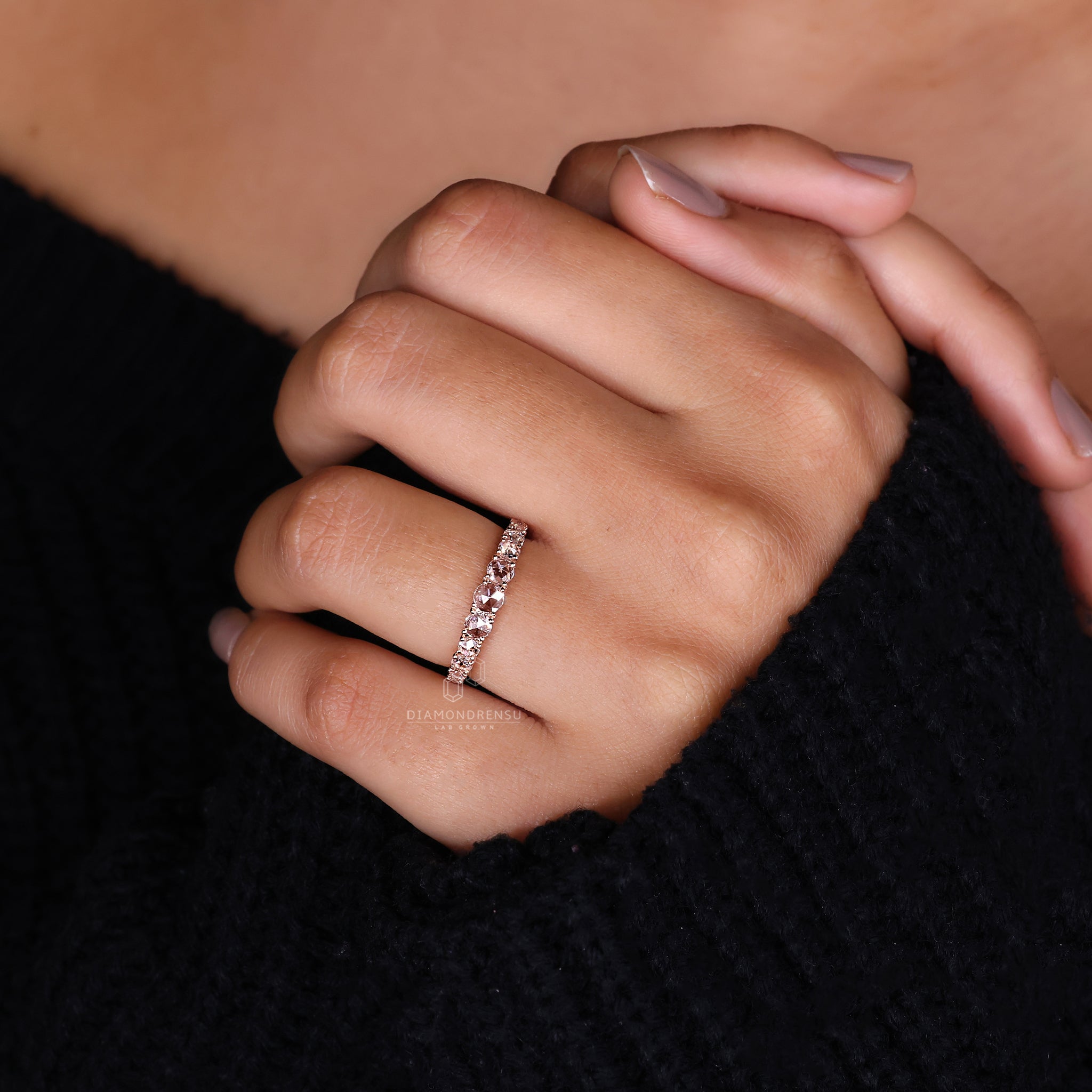 Handmade diamond wedding band in rose gold.
