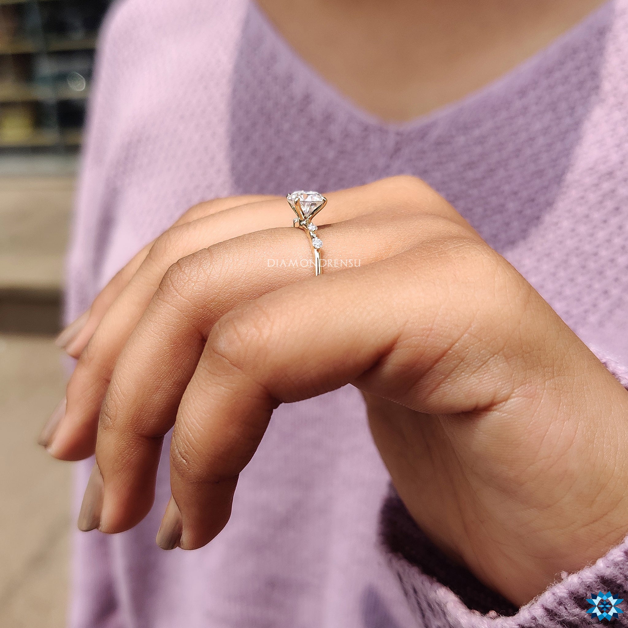 Moissanite for an engagement ring in yellow gold with 4 prong mount.
