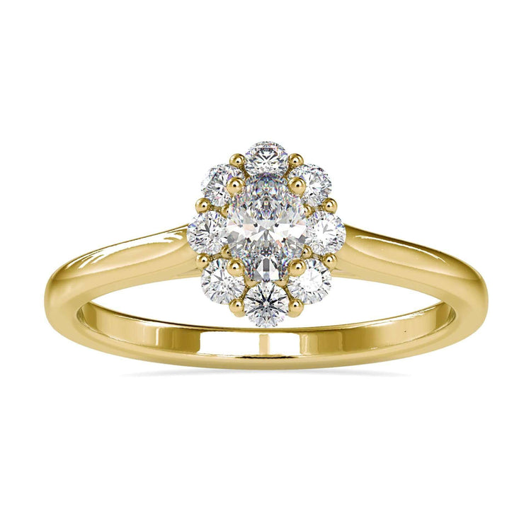 Oval cluster engagement ring with round diamond side stones.
