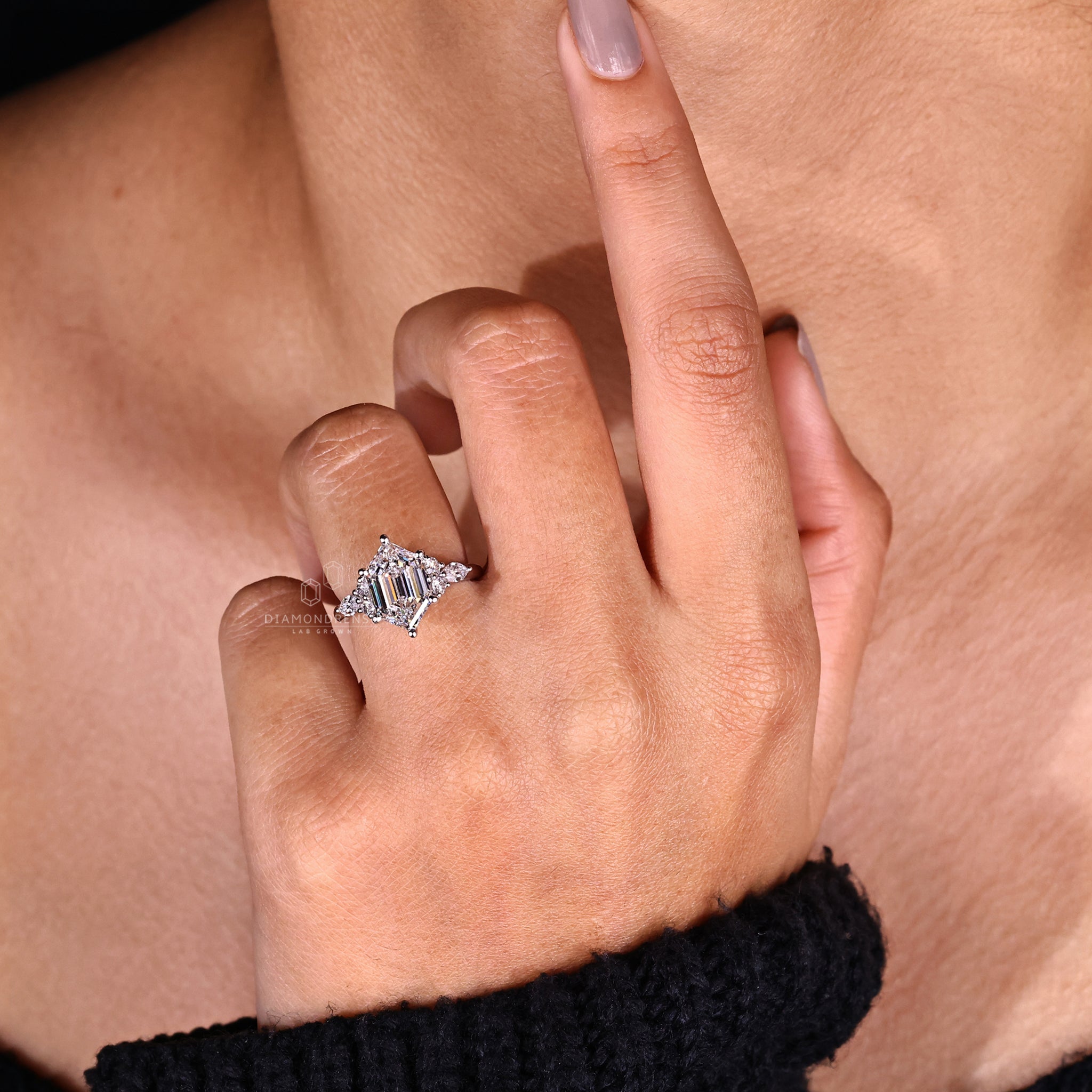 Diamond Ring with Marquise Side Stones for added glamour.