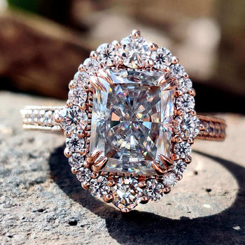 Radiant cut moissanite engagement ring in rose gold.
