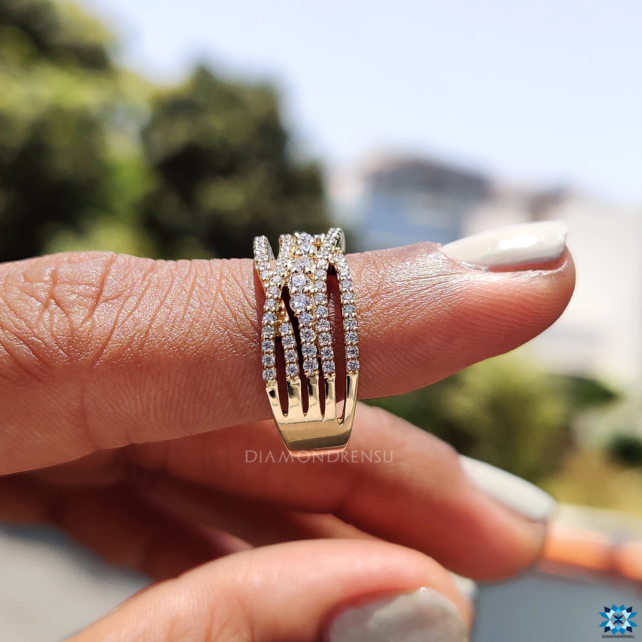 Buy engagement ring in yellow gold with multi pave details.
