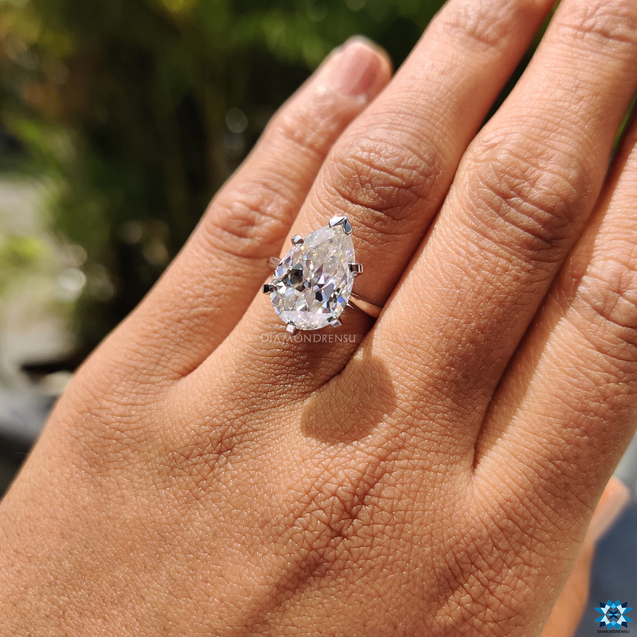 White gold engagement ring featuring a 5 prong setting with one secure V prong.
