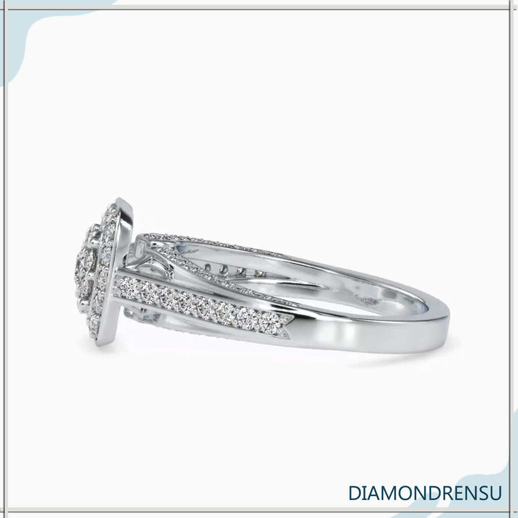 Pave setting ring with round diamond and bridge accents.
