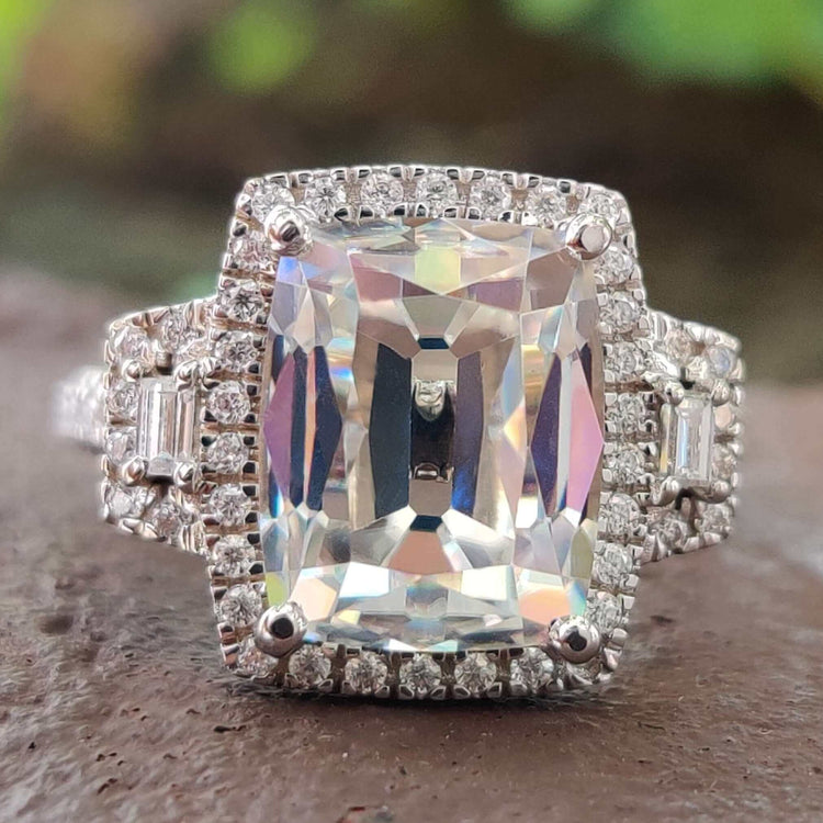 Elongated cushion old European cut moissanite ring in white gold.
