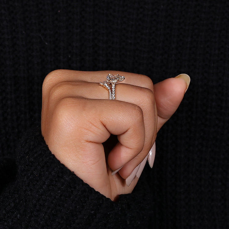 Yellow gold pear engagement ring set.
