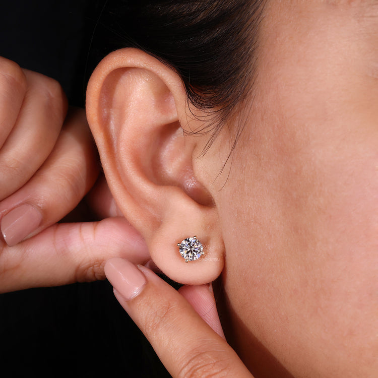 Gold round diamond stud earrings crafted by Diamondrensu UK.