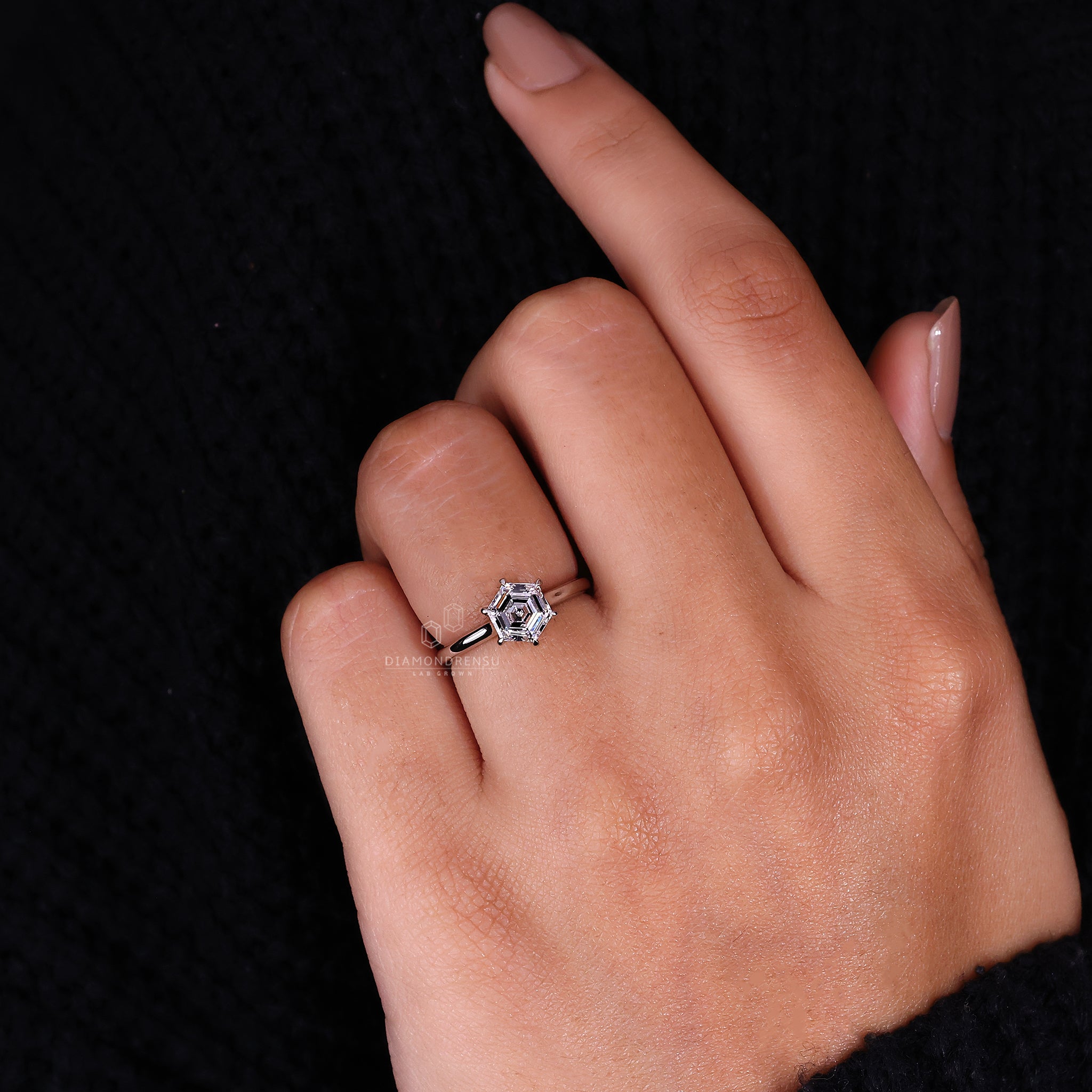 Lab grown hexagon diamond ring in white gold.
