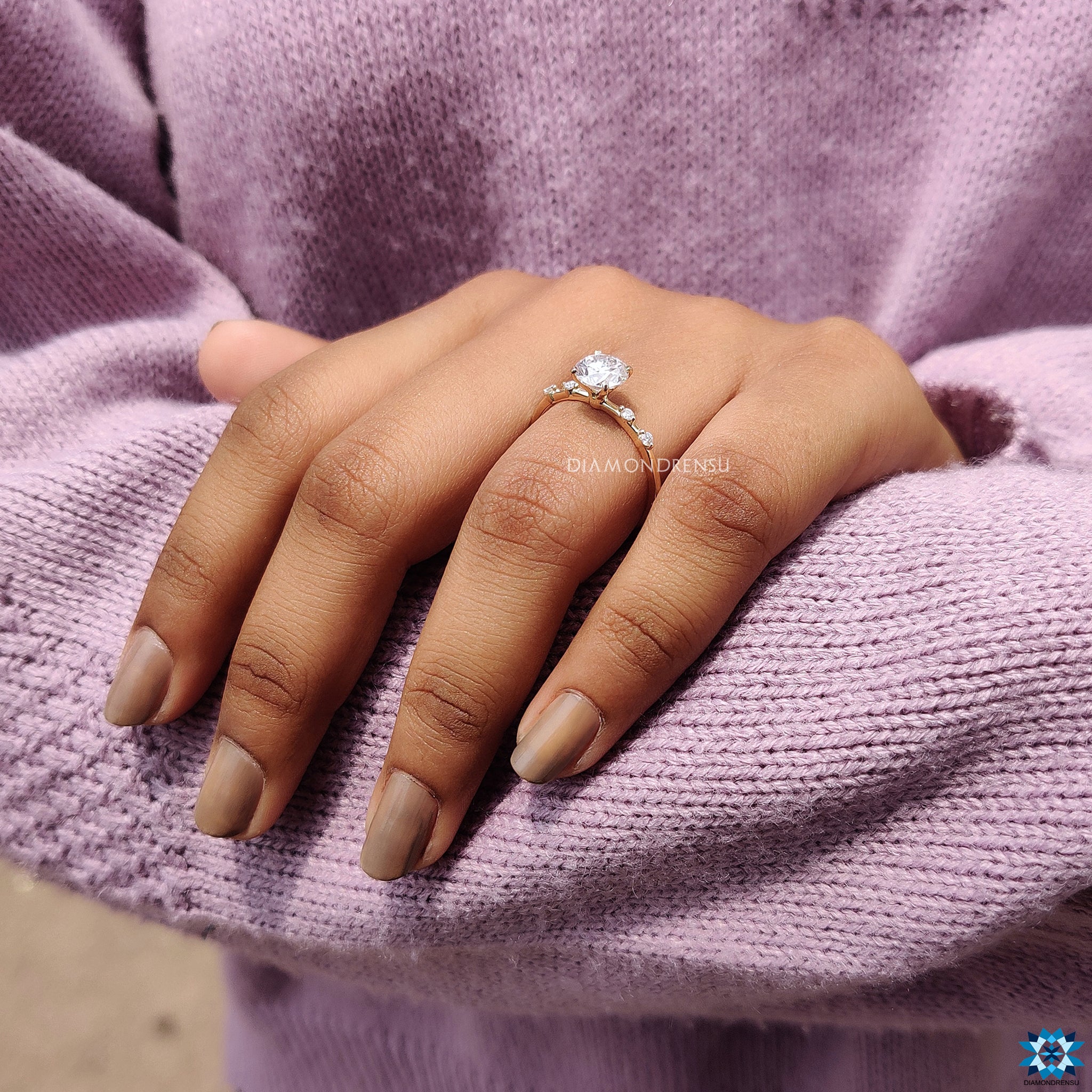 Delicate 1 carat moissanite ring with pave band and handmade finish.
