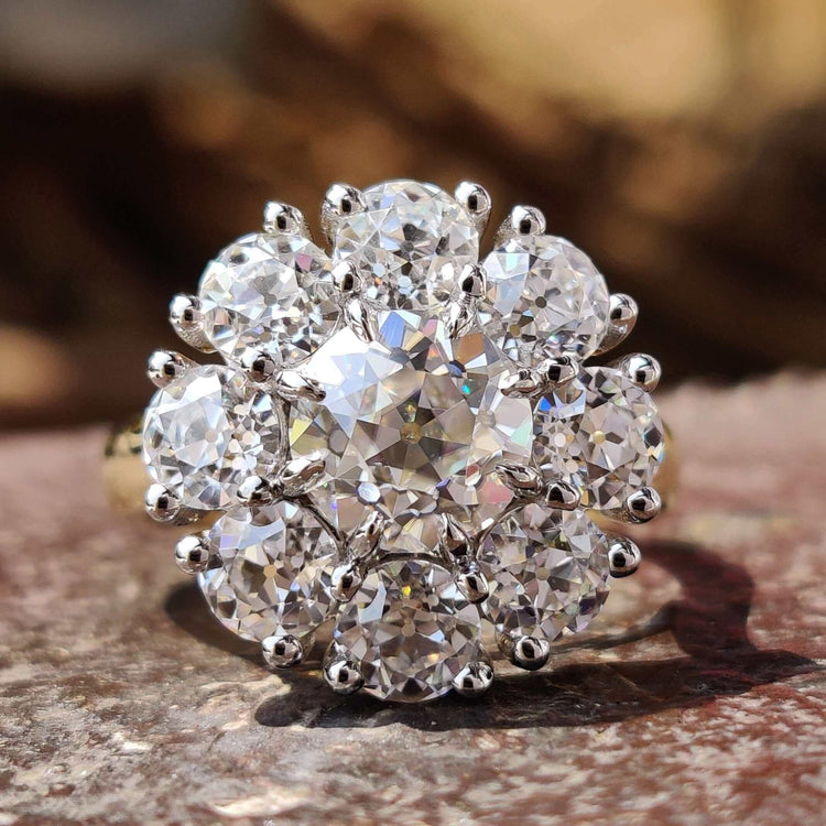 Old European cut moissanite ring in a two-tone gold setting by Diamondrensu UK.
