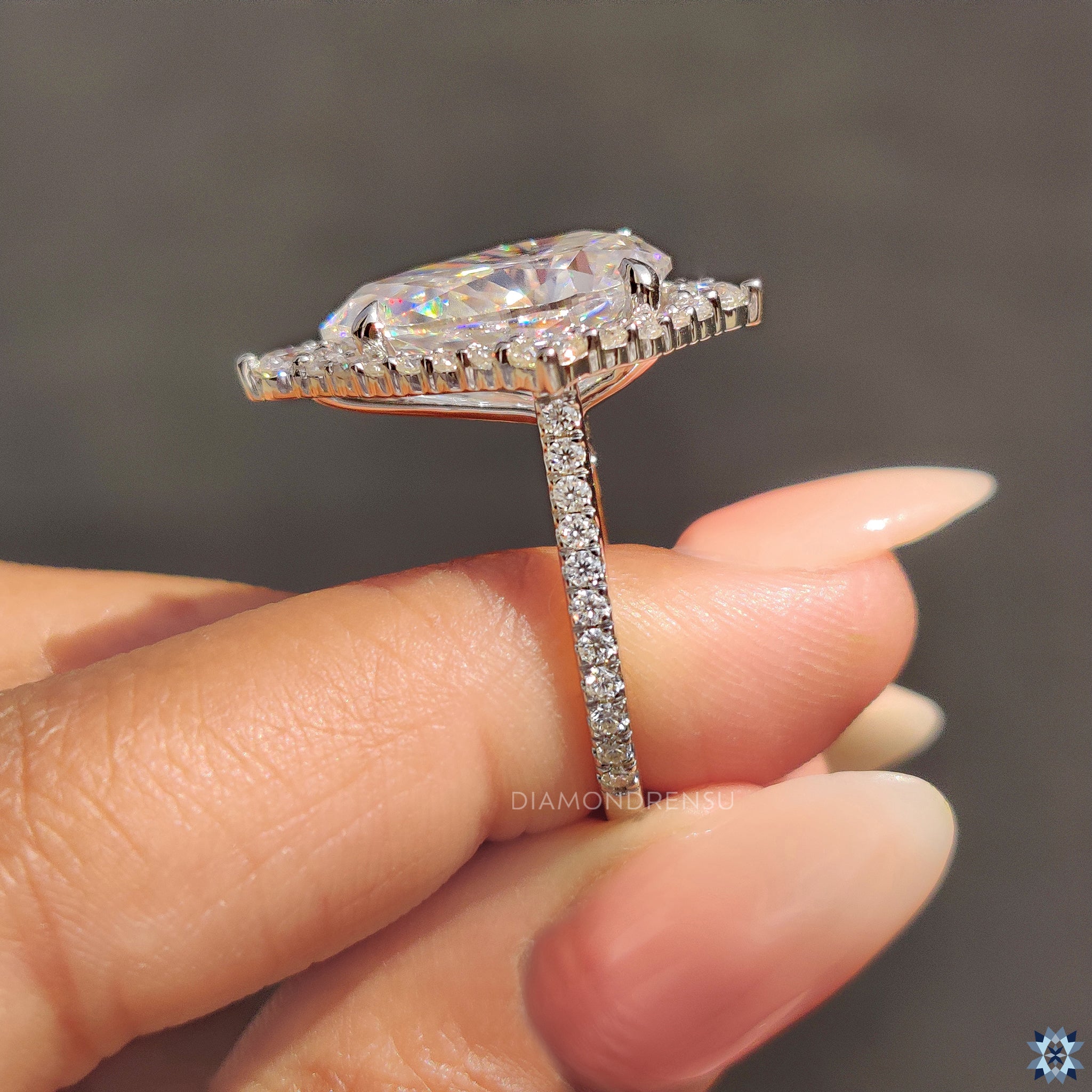 Custom engagement ring with pear shape engagement ring
