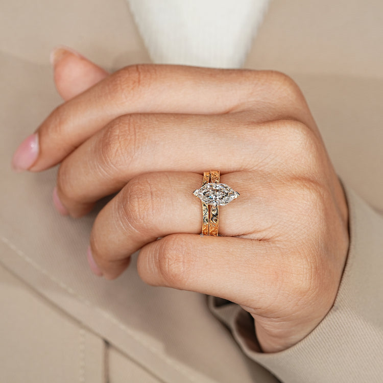 Solitaire bridal set with compass prong setting.