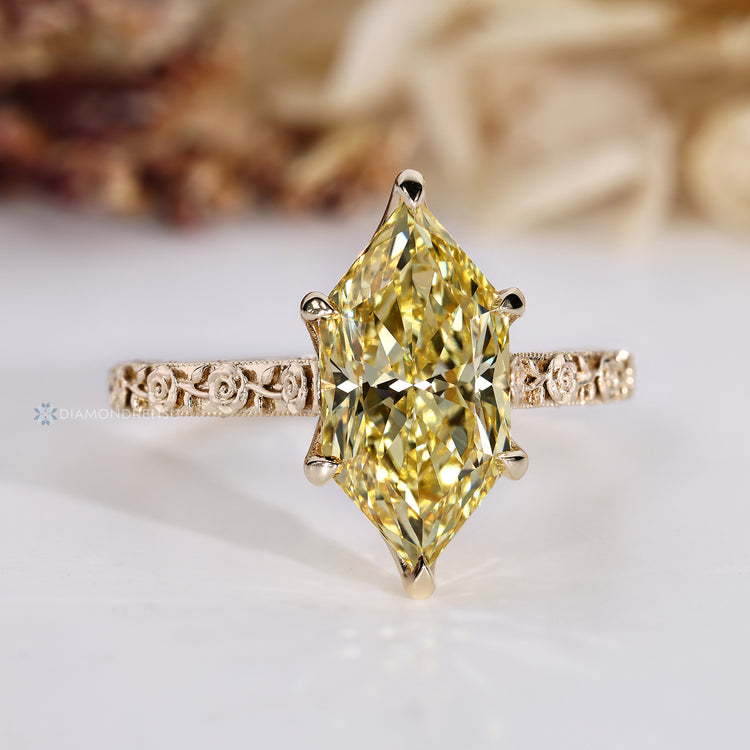 Art Deco engagement ring with milgrain details and prongs.