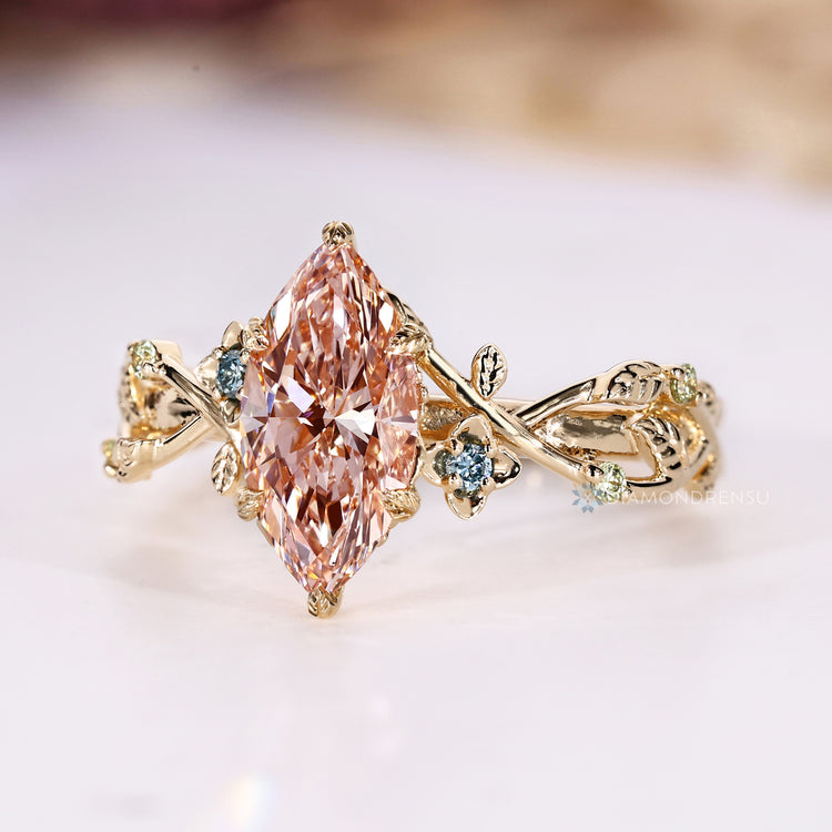 Handmade marquise diamond ring with six leaf prong setting.