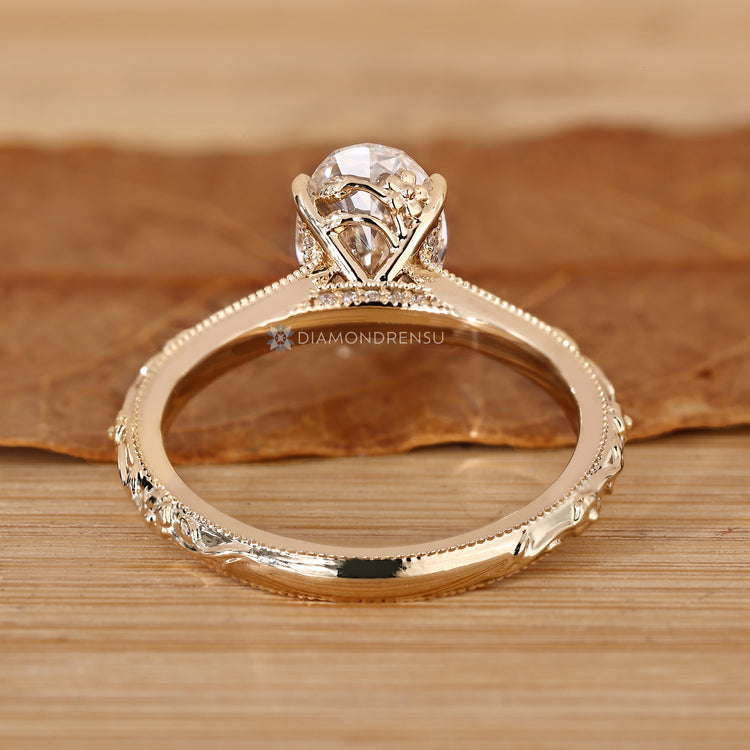 Art deco diamond ring with hidden bridge accent.