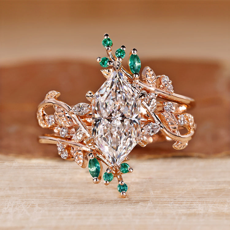 Dutch Marquise wedding ring with marquise and round side stones.