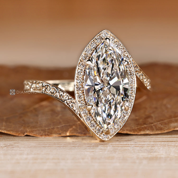 Lab grown diamond ring with six claw prong setting.