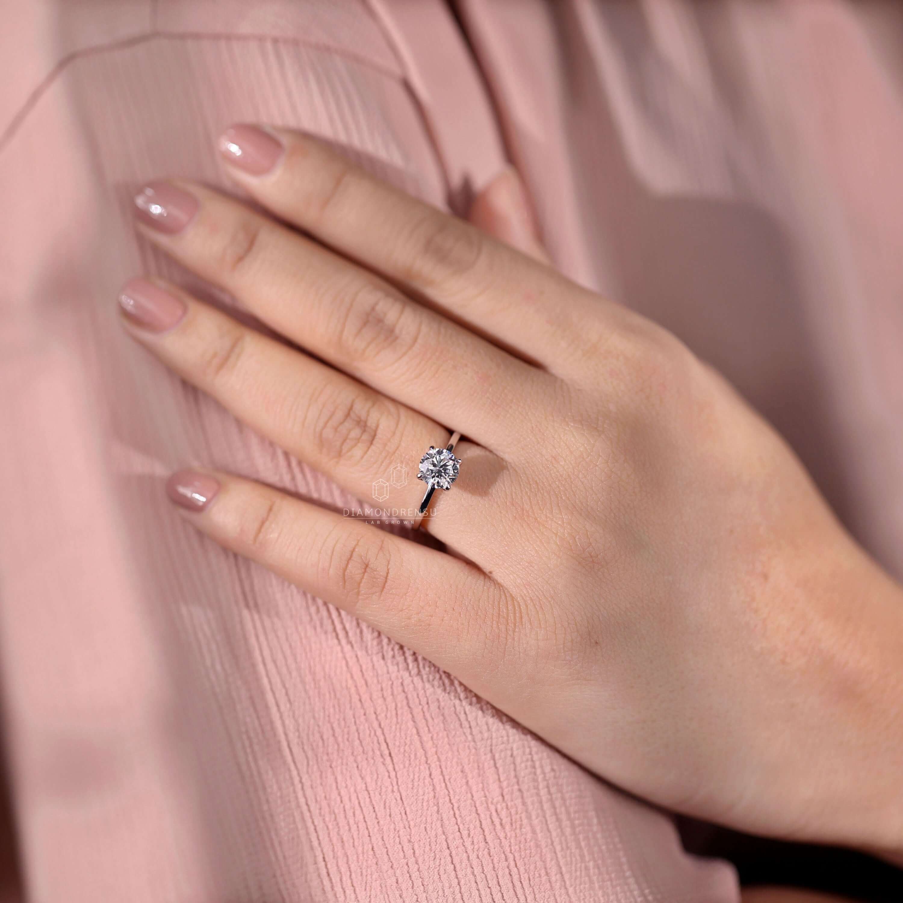 Round diamond ring handcrafted for a unique engagement style
